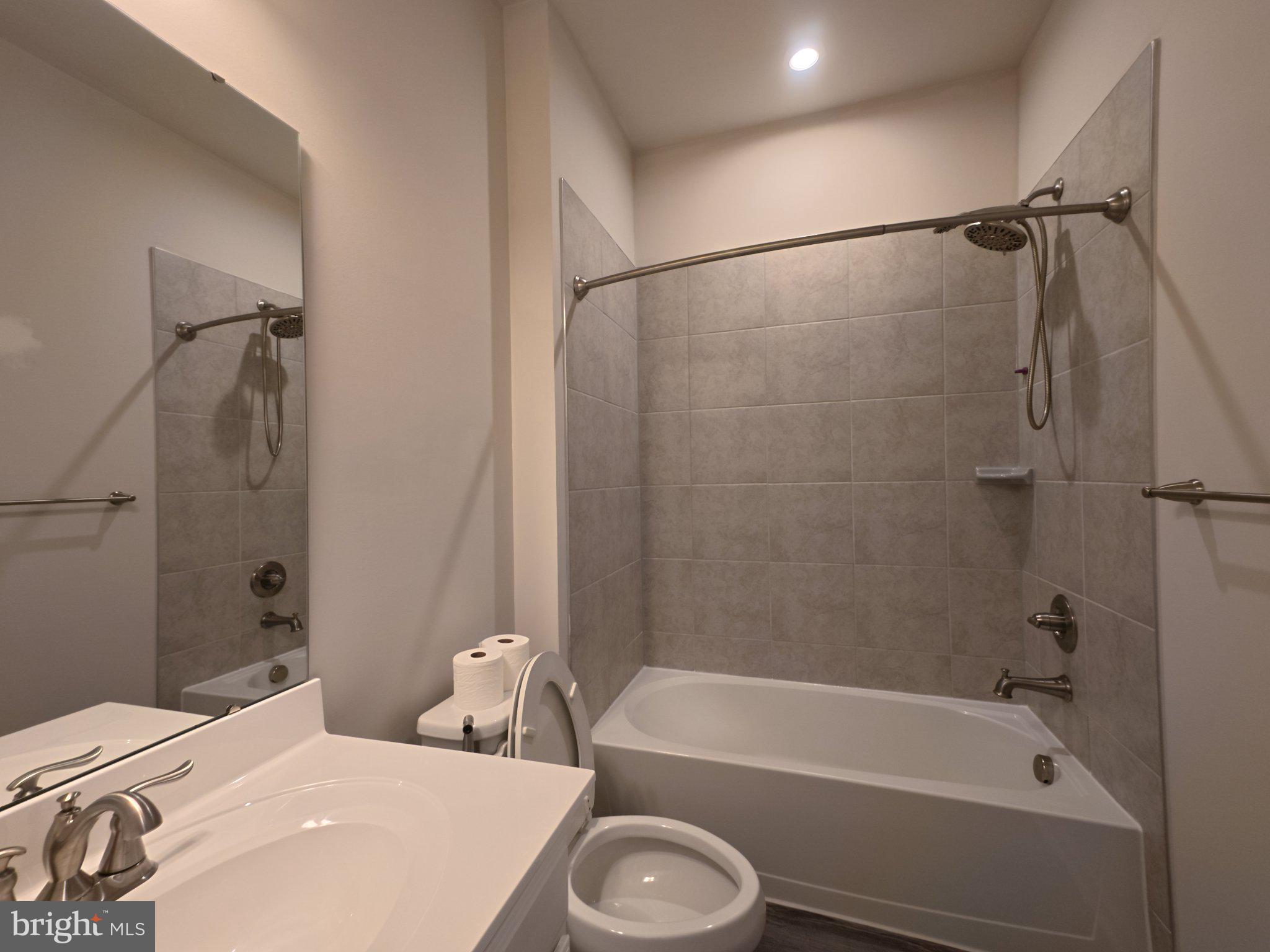 7838 Mine Run Road Hanover, MD 21076 - Photo 14 of 19 Modern bathroom with sleek finishes.