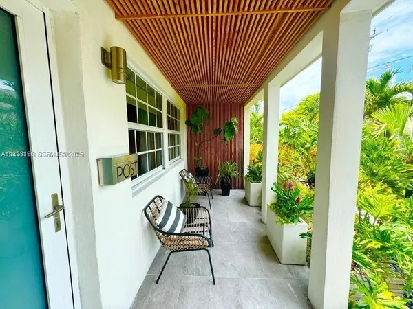 a house view with a seating space