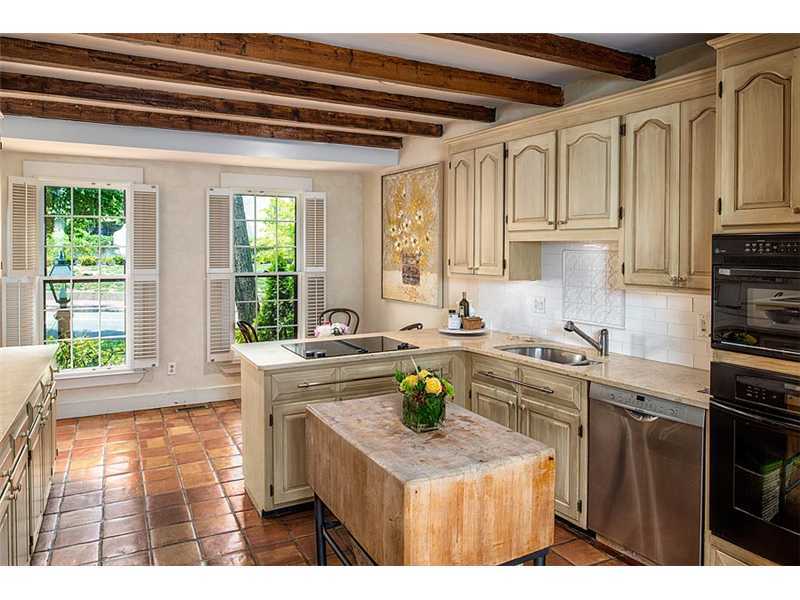 603 Steamboat Road, Unit 2 Greenwich, CT 06830 - Photo 4 of 10 a kitchen with stainless steel appliances granite countertop a sink stove and cabinets