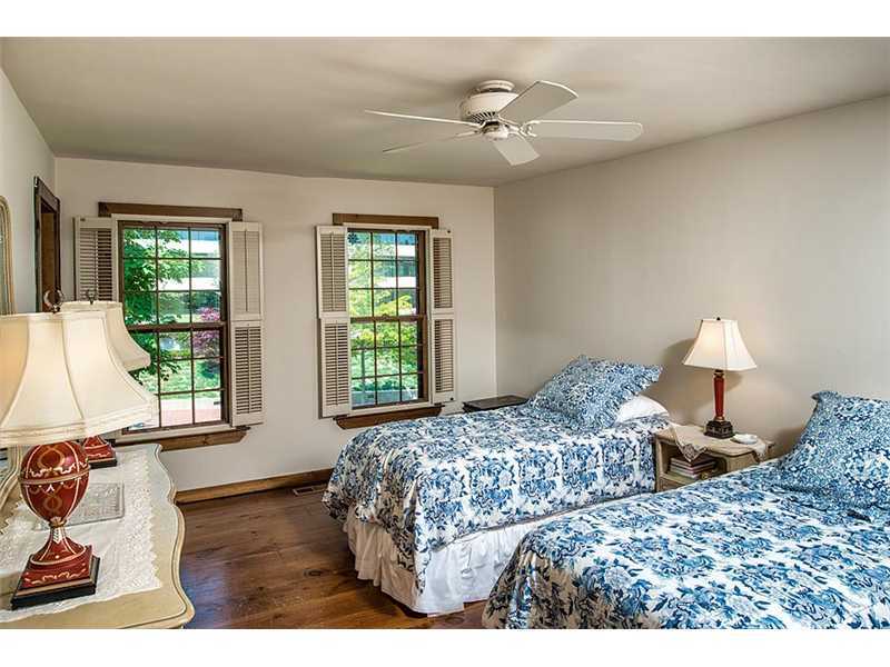603 Steamboat Road, Unit 2 Greenwich, CT 06830 - Photo 7 of 10 a bedroom with a bed and a window