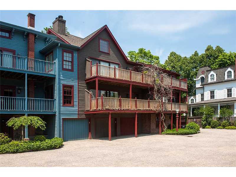 603 Steamboat Road, Unit 2 Greenwich, CT 06830 - Photo 8 of 10 a front view of a house with a yard