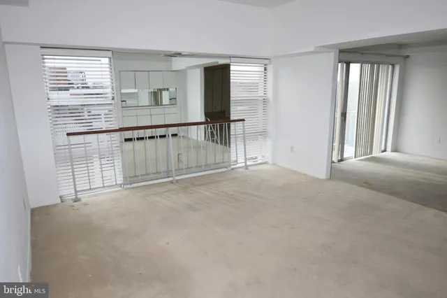 an empty room with windows