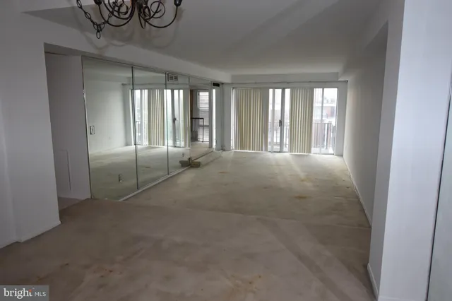 a view of an empty room and window