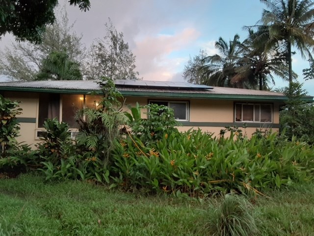 35 Door Of Faith Road Haiku, HI 96708 - Photo 1 of 8 a front view of a house with a garden
