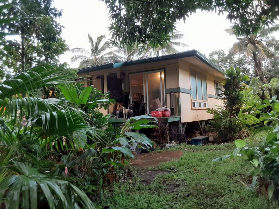 35 Door Of Faith Road Haiku, HI 96708 - Photo 2 of 8 a front view of house with yard and outdoor seating
