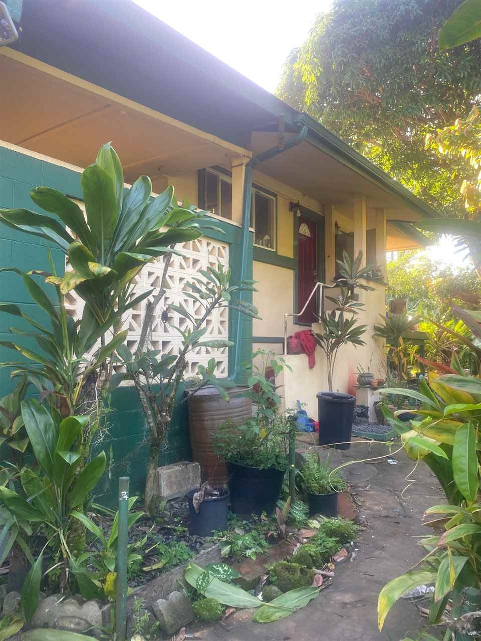 35 Door Of Faith Road Haiku, HI 96708 - Photo 8 of 8 a front view of a house with garden