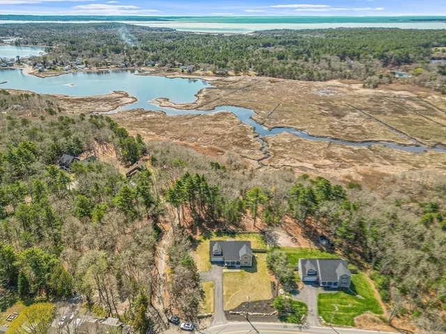 a view of a city with an ocean