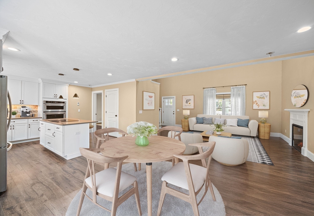 52 Great Neck Road Wareham, MA 02538 - Photo 15 of 42 a view of a dining room with furniture and wooden floor