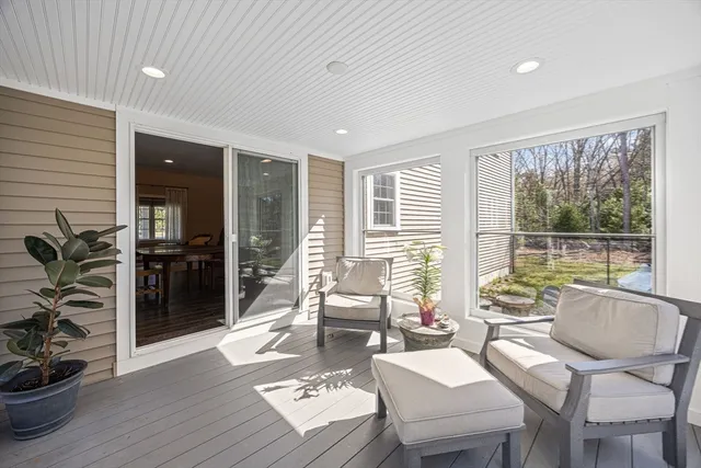 a bathroom with a sink toilet and a mirror