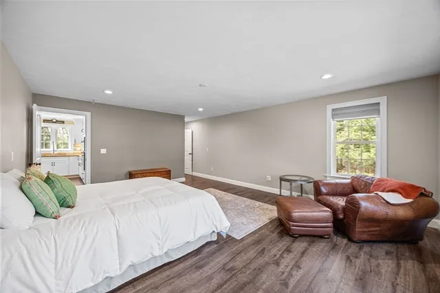 a work room with furniture and windows