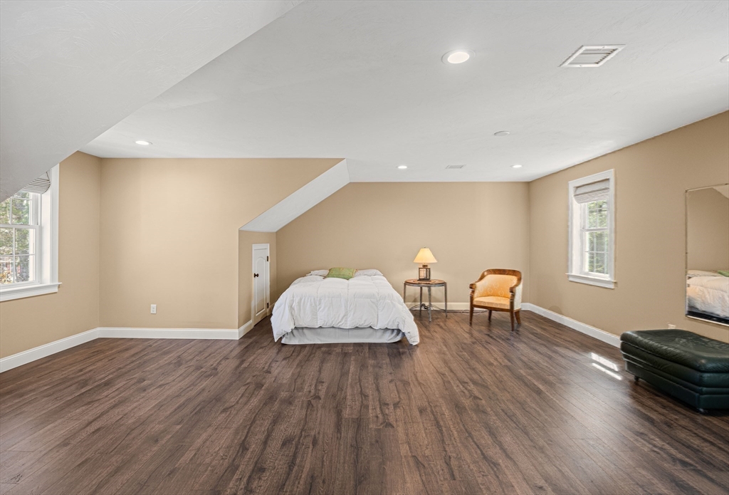 52 Great Neck Road Wareham, MA 02538 - Photo 25 of 42 a living room with furniture and a wooden floor