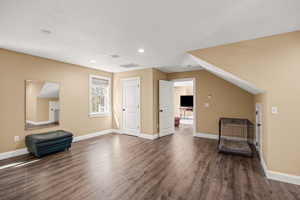 52 Great Neck Road Wareham, MA 02538 - Photo 27 of 42 a view of a livingroom with wooden floor and furniture