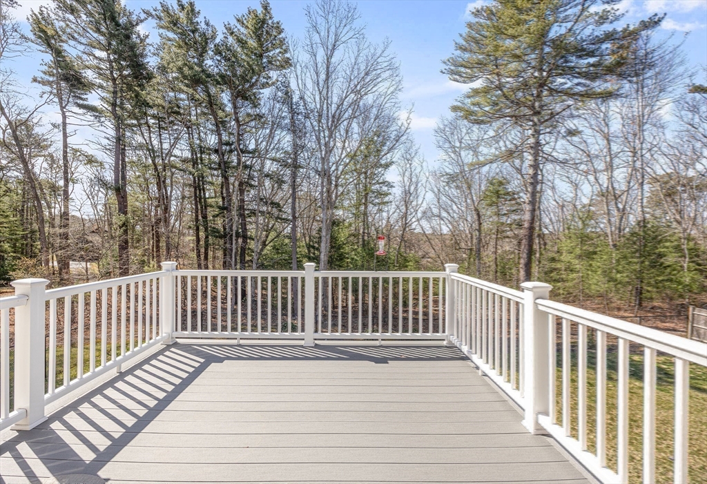 52 Great Neck Road Wareham, MA 02538 - Photo 31 of 42 a view of a wooden roof deck