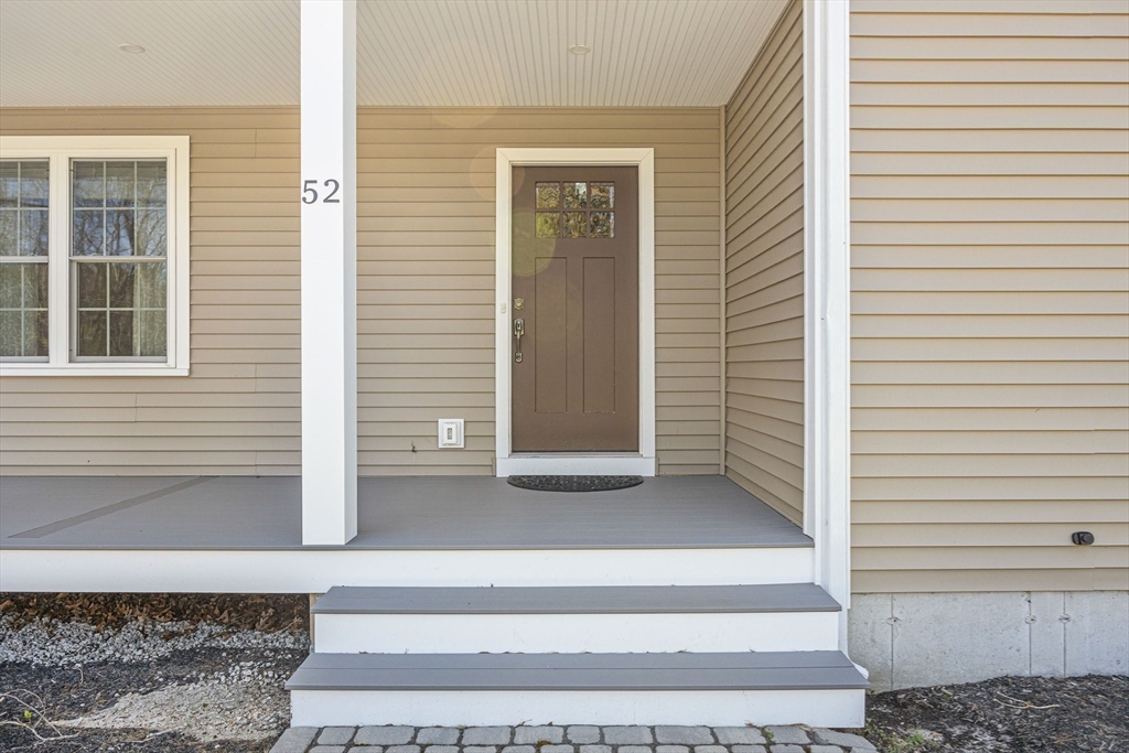 52 Great Neck Road Wareham, MA 02538 - Photo 7 of 42 a view of a entryway front of a house