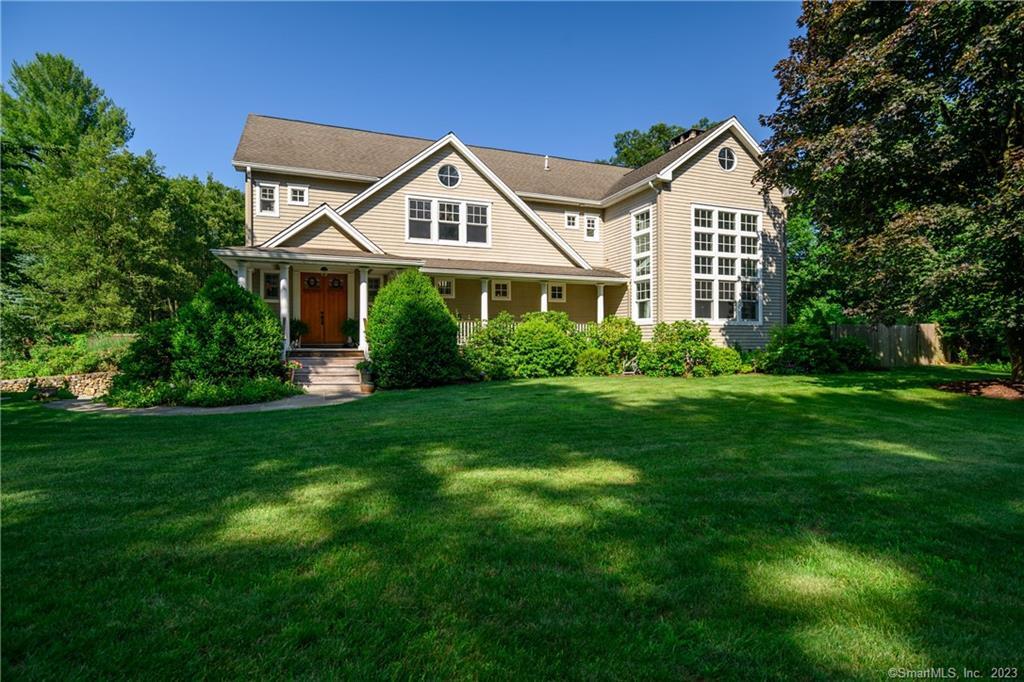 7 Buckthorn Road Norwalk, CT 06851 - Photo 1 of 1 a front view of a house with a yard