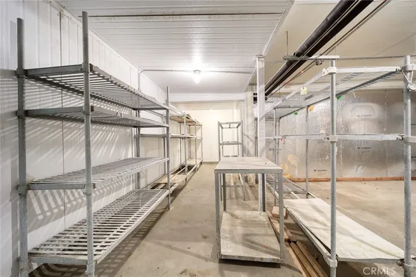 a view of a balcony with furniture