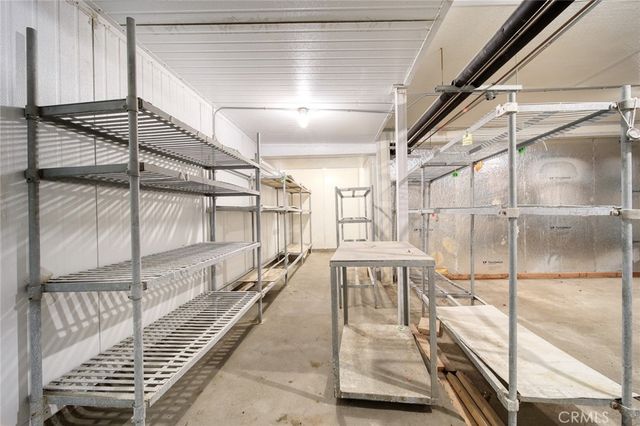 a view of a balcony with furniture