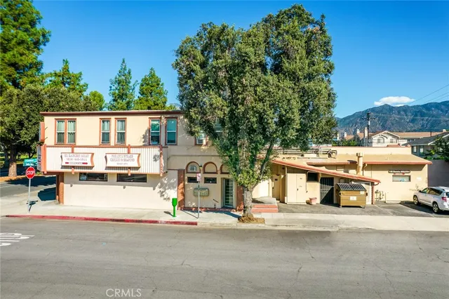 a view of a street with cars