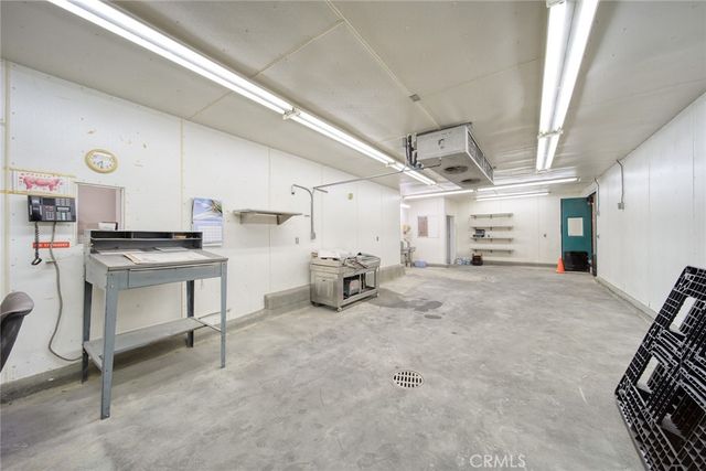 a view of storage and utility room with racks