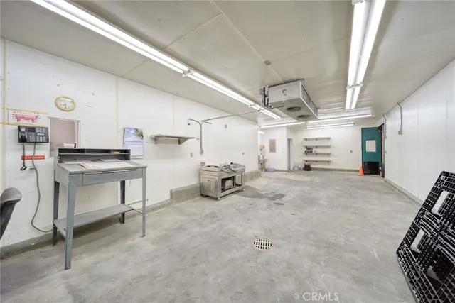 a view of storage and utility room with racks
