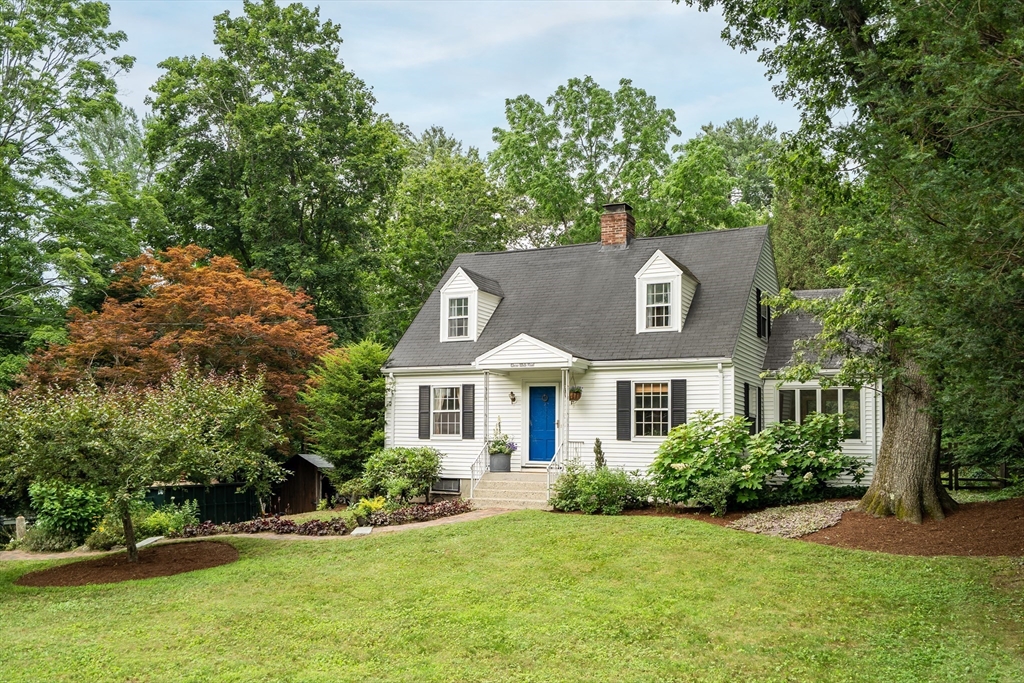 3 White Road Wayland, MA 01778 - Photo 1 of 19 a front view of a house with a yard
