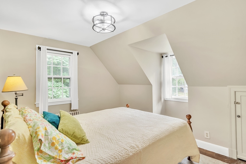 3 White Road Wayland, MA 01778 - Photo 16 of 19 a bedroom with a bed and a window