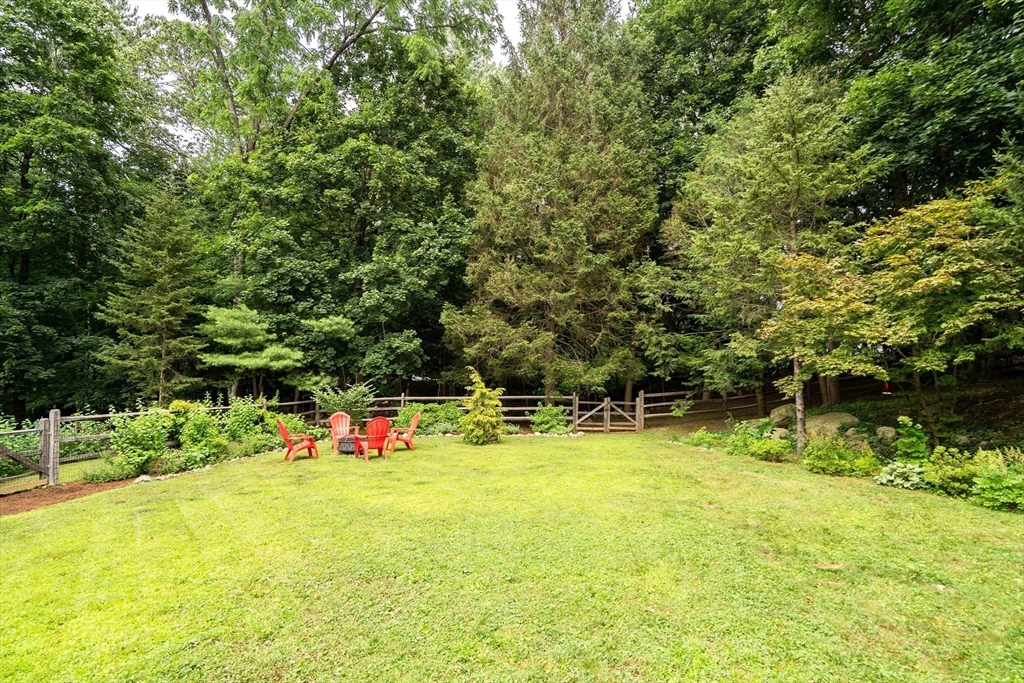3 White Road Wayland, MA 01778 - Photo 18 of 19 a view of a swimming pool with an outdoor space and seating area