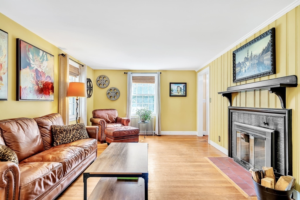 3 White Road Wayland, MA 01778 - Photo 3 of 19 a living room with furniture or couch and a fireplace