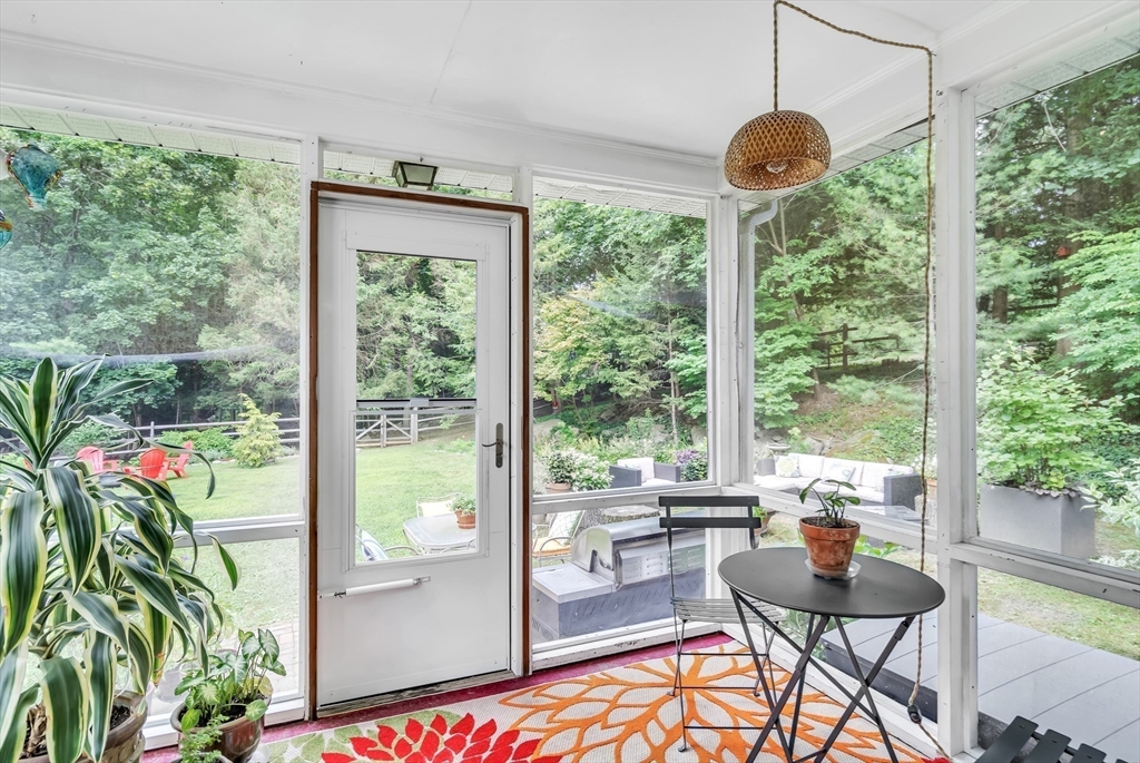 3 White Road Wayland, MA 01778 - Photo 10 of 19 a living room with patio and garden