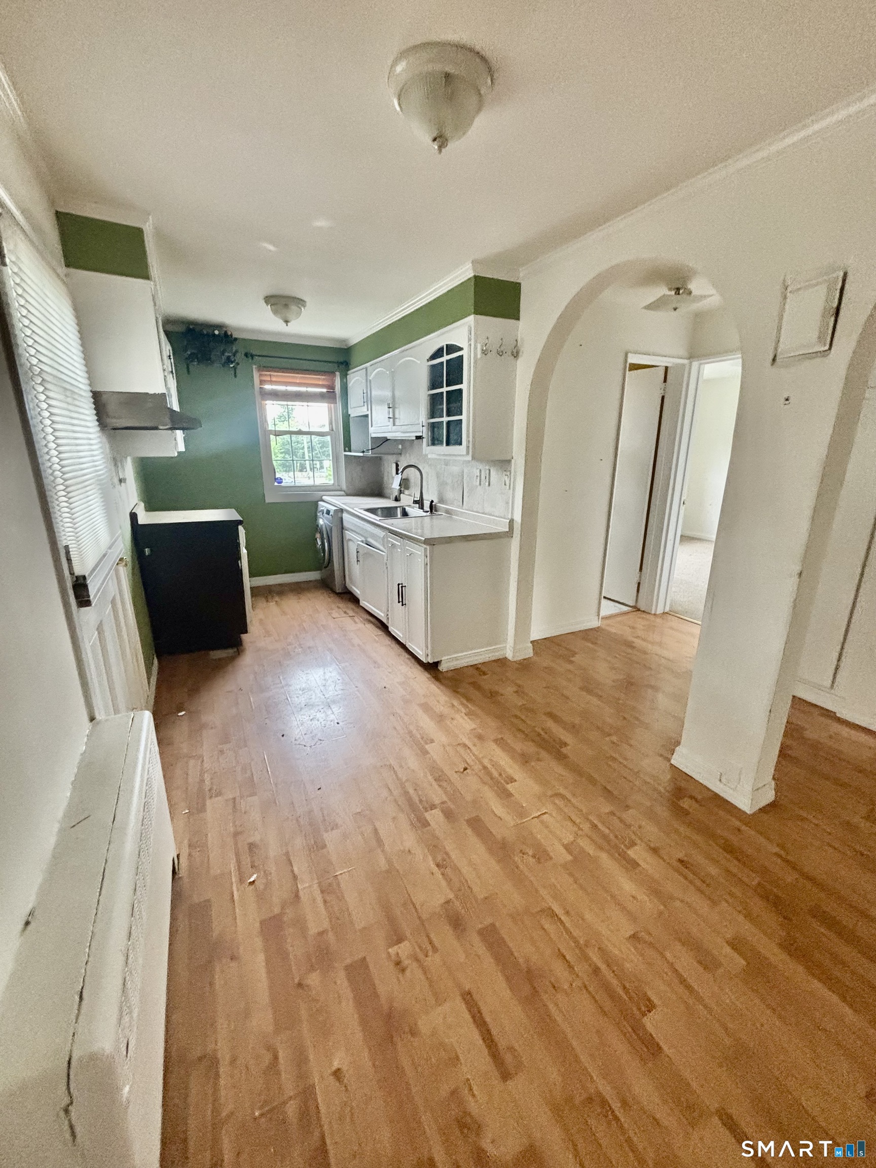 74 Standish Road, Unit 3 Stamford, CT 06902 - Photo 13 of 22 a living room with furniture and a flat screen tv