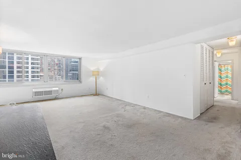 a kitchen with a stove and a refrigerator