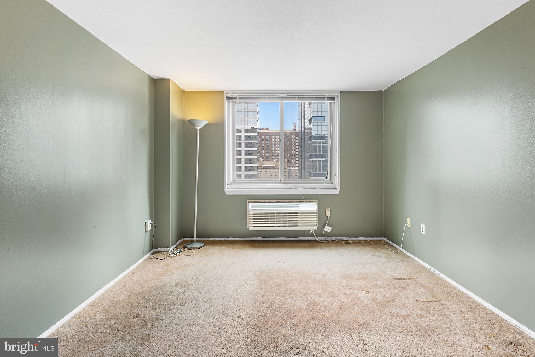 1919 Chestnut Street, Unit 202324 Philadelphia, PA 19103 - Photo 23 of 38 an empty room with windows