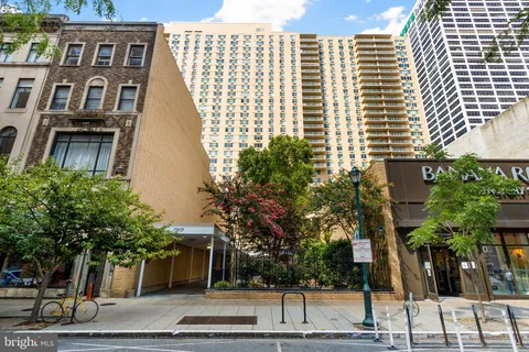 a backyard of a building with lots of green space