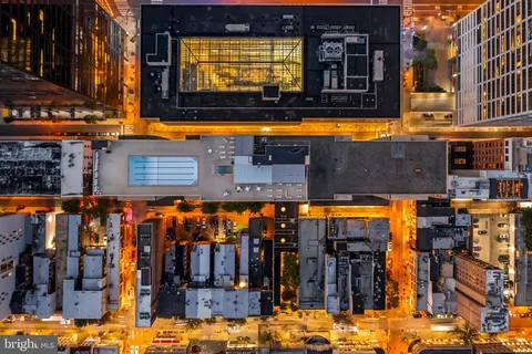 a view of a swimming pool with a outdoor seating