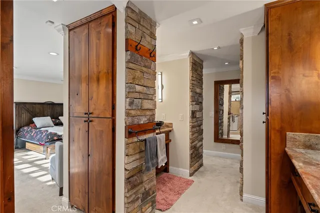 a view of a patio with a table and chairs under an umbrella with a patio