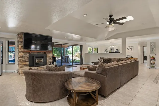 a kitchen with stainless steel appliances granite countertop a sink and a stove