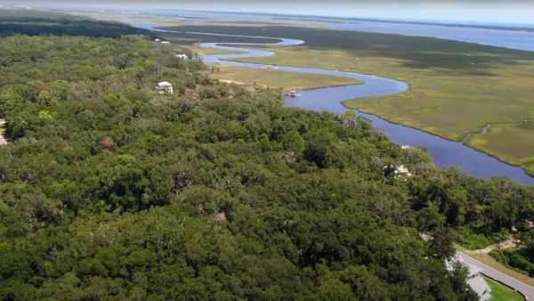a view of a lake with a large window