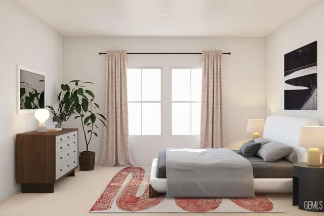 a living room with furniture and a rug