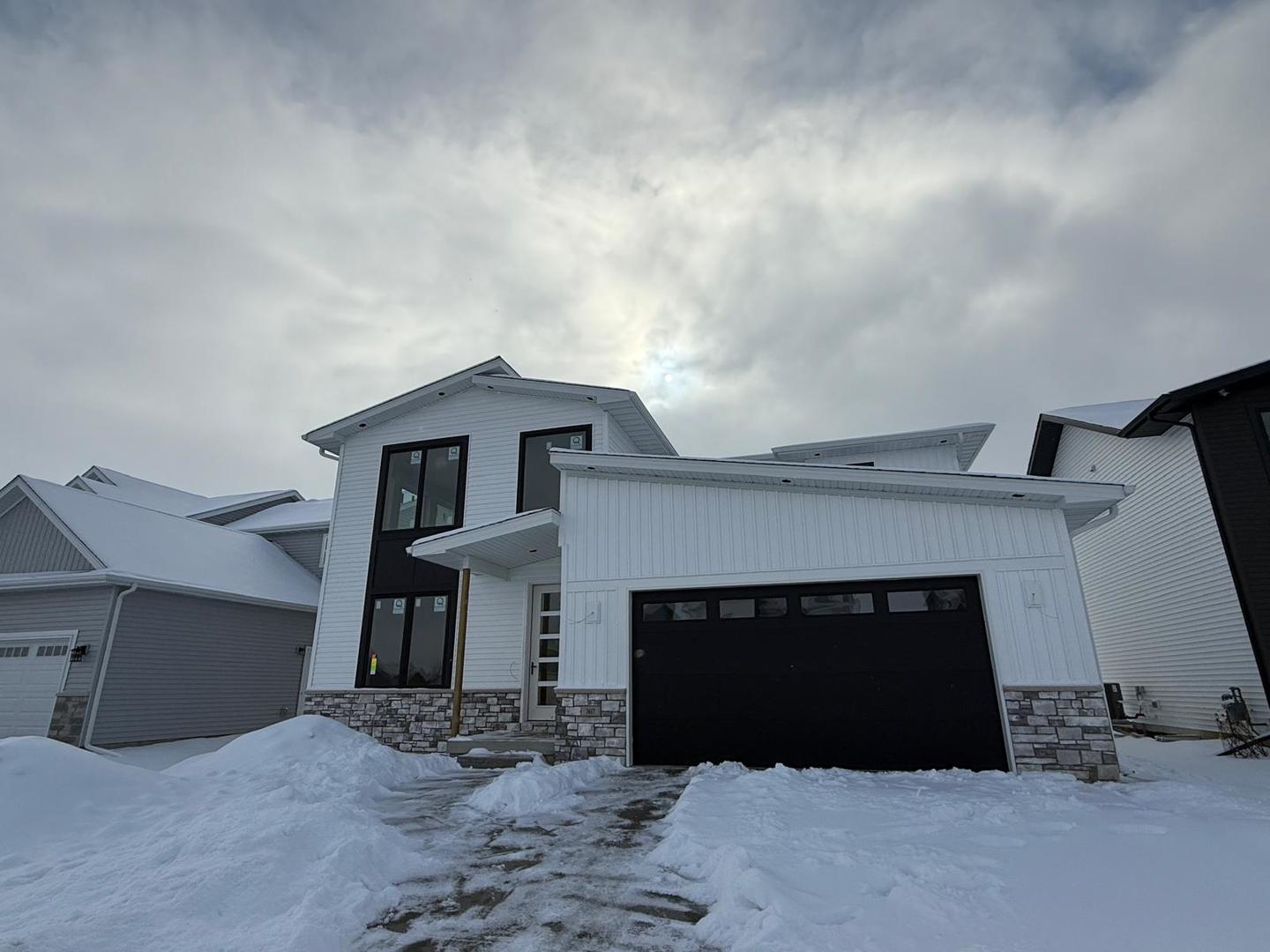 3617 Cabernet Court Normal, IL 61761 - Photo 2 of 9 a view of a livingroom with a fireplace