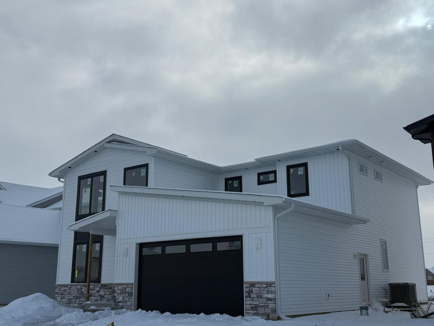 3617 Cabernet Court Normal, IL 61761 - Photo 3 of 9 a kitchen with a fireplace and cabinets
