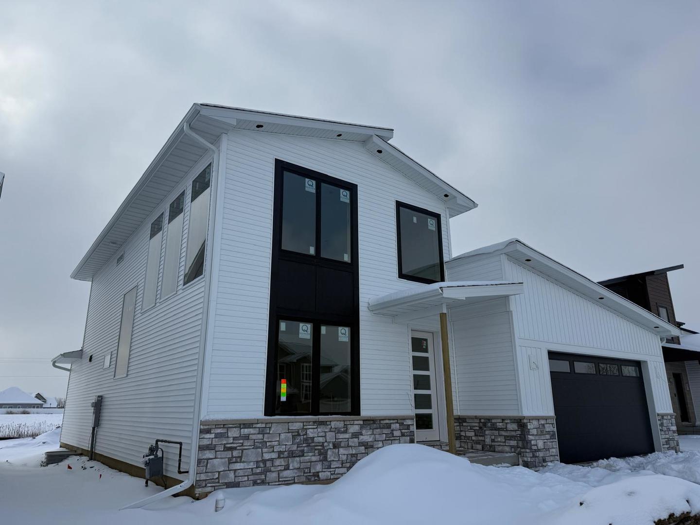3617 Cabernet Court Normal, IL 61761 - Photo 4 of 9 a front view of house with garage