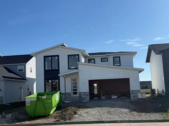 a front view of a house with a fireplace
