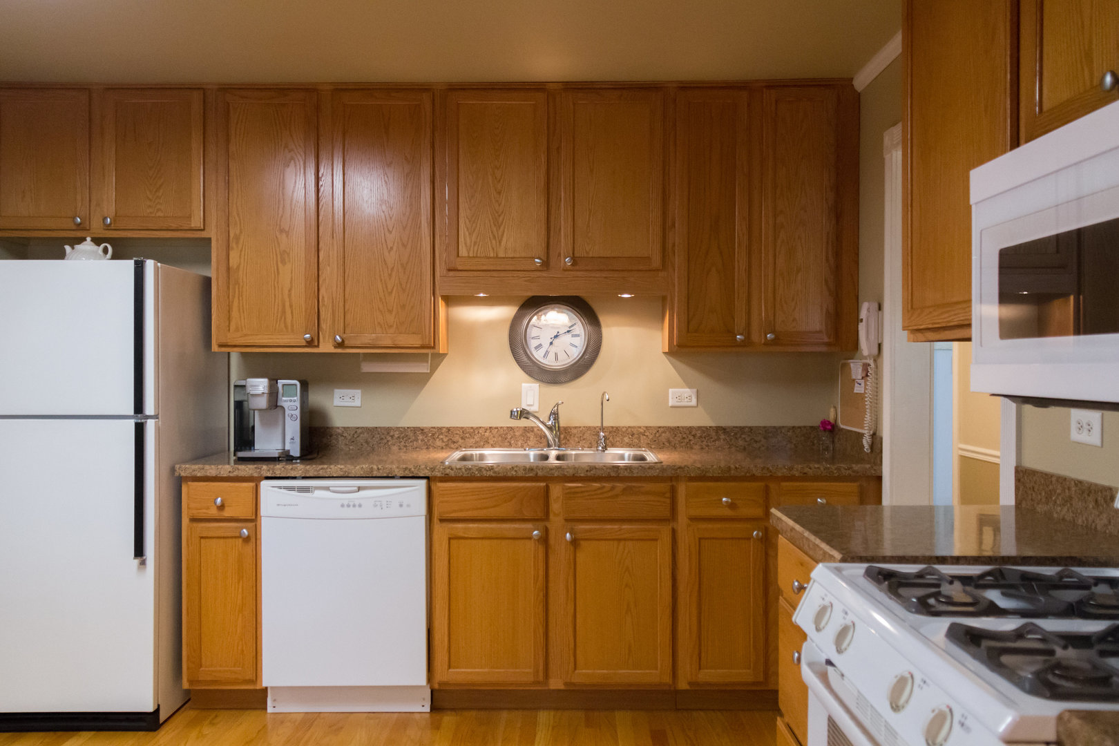 15254 Arroyo Drive Oak Forest, IL 60452 - Photo 11 of 39 a kitchen with cabinets and stainless steel appliances