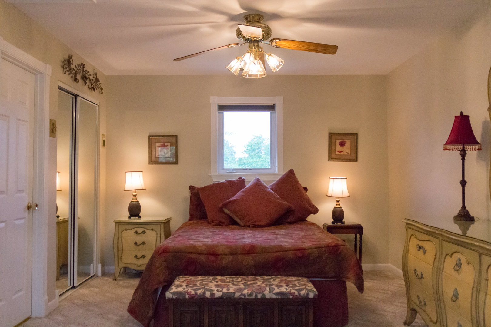 15254 Arroyo Drive Oak Forest, IL 60452 - Photo 23 of 39 a bedroom with a bed and a chandelier