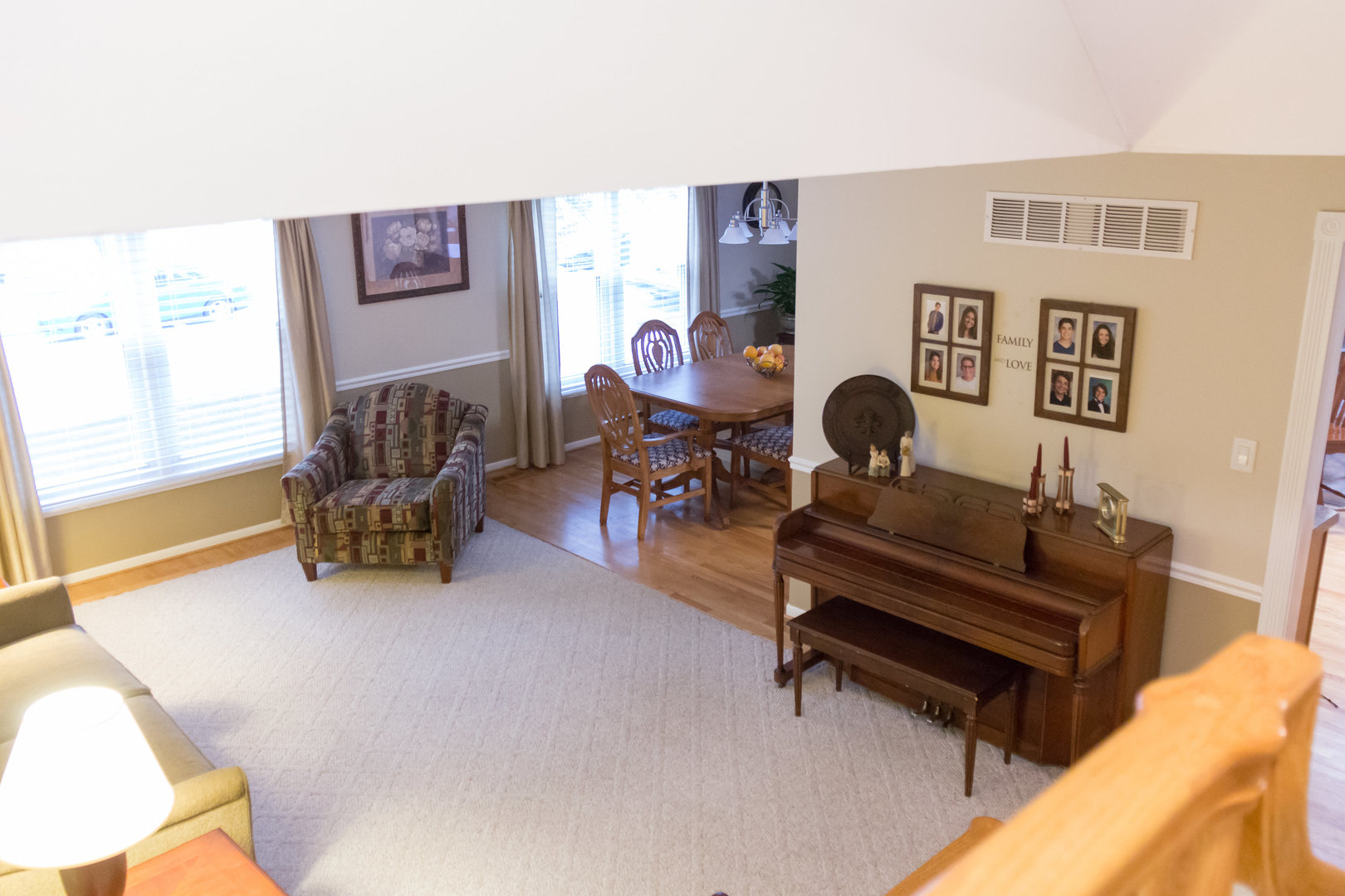 15254 Arroyo Drive Oak Forest, IL 60452 - Photo 25 of 39 a living room with furniture and a flat screen tv with the kitchen view