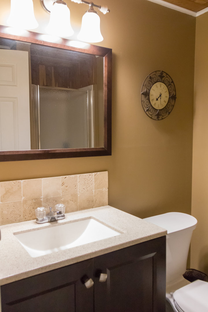 15254 Arroyo Drive Oak Forest, IL 60452 - Photo 33 of 39 a bathroom with a sink a toilet and mirror