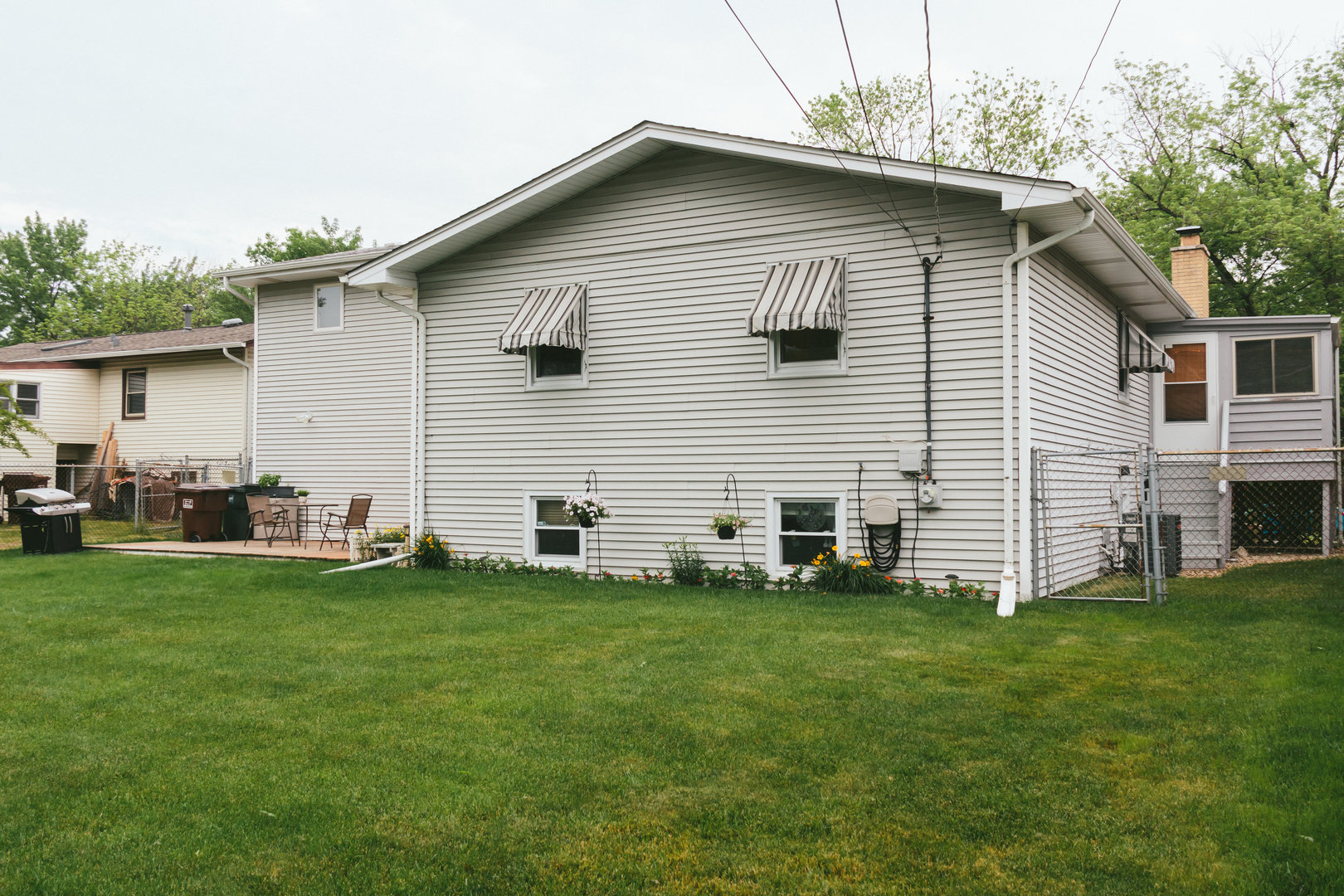 15254 Arroyo Drive Oak Forest, IL 60452 - Photo 35 of 39 a view of a house with a yard