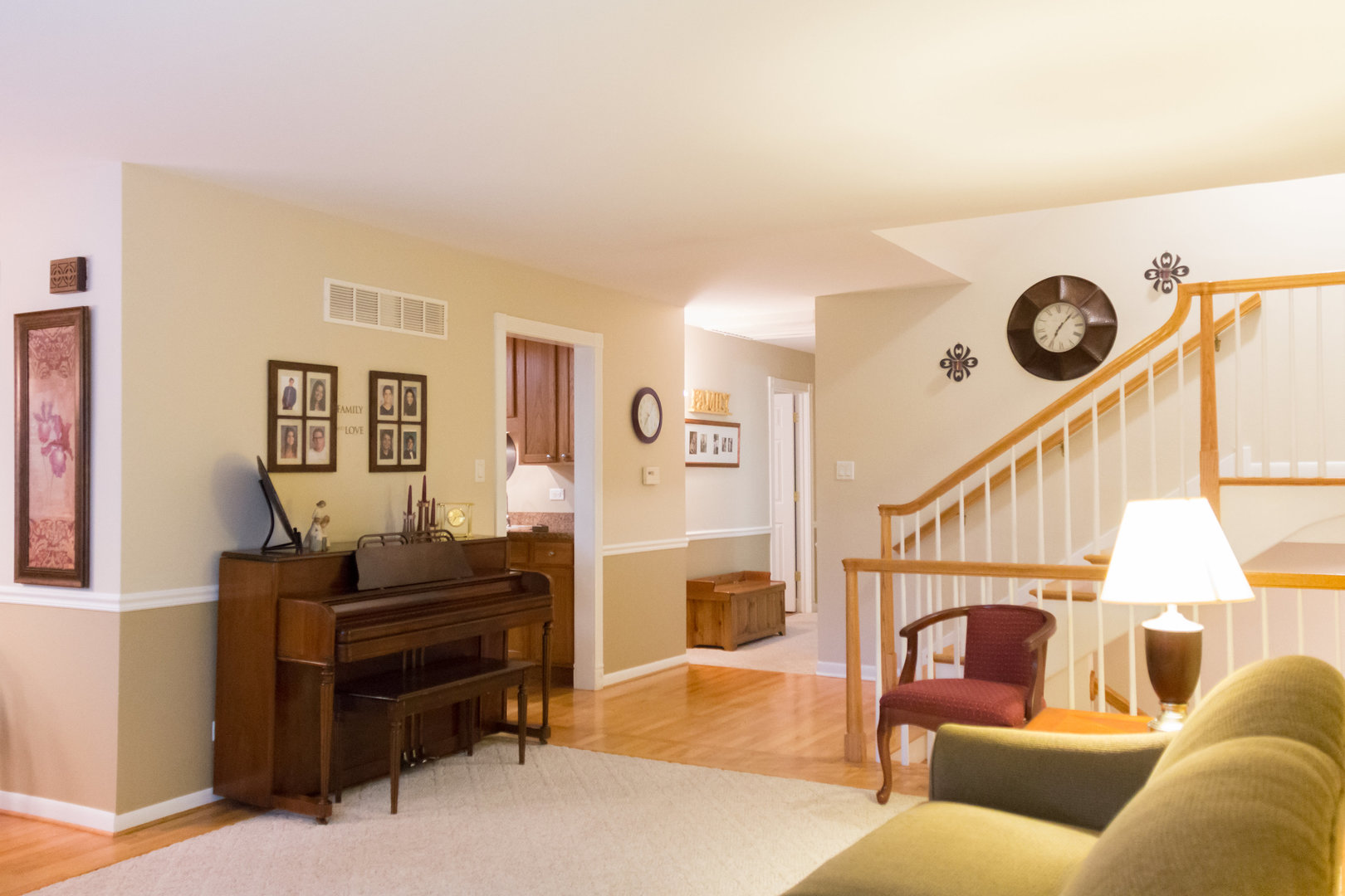 15254 Arroyo Drive Oak Forest, IL 60452 - Photo 4 of 39 a living room with furniture and a stairs