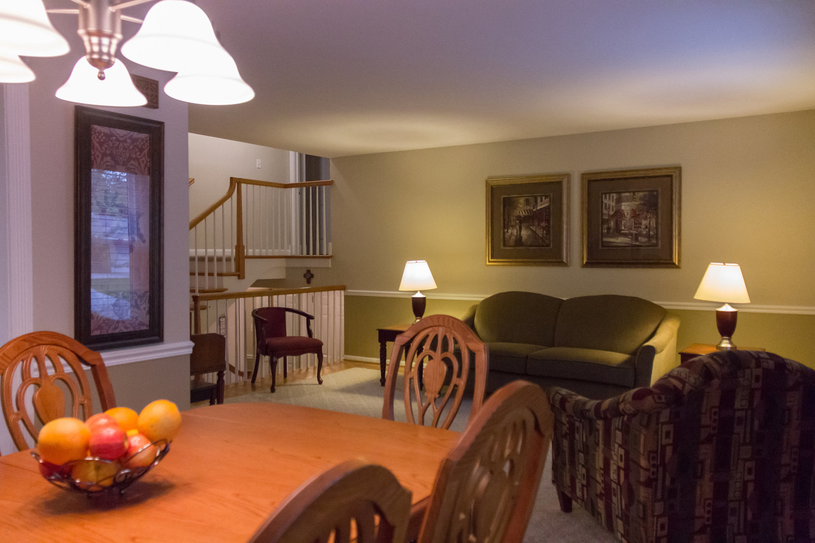 15254 Arroyo Drive Oak Forest, IL 60452 - Photo 6 of 39 a living room with furniture a chandelier and a lamp