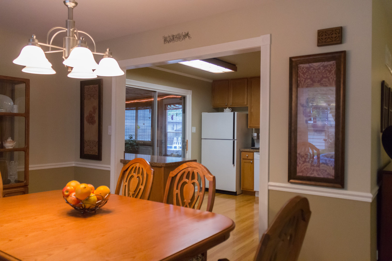 15254 Arroyo Drive Oak Forest, IL 60452 - Photo 7 of 39 a view of a dining room with furniture window and wooden floor
